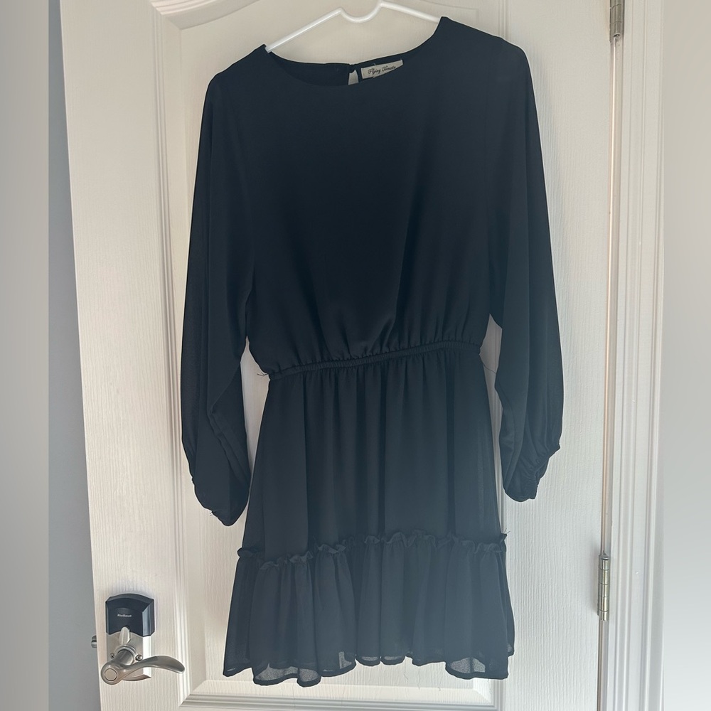 Black Long sleeve ruffle bottom dress